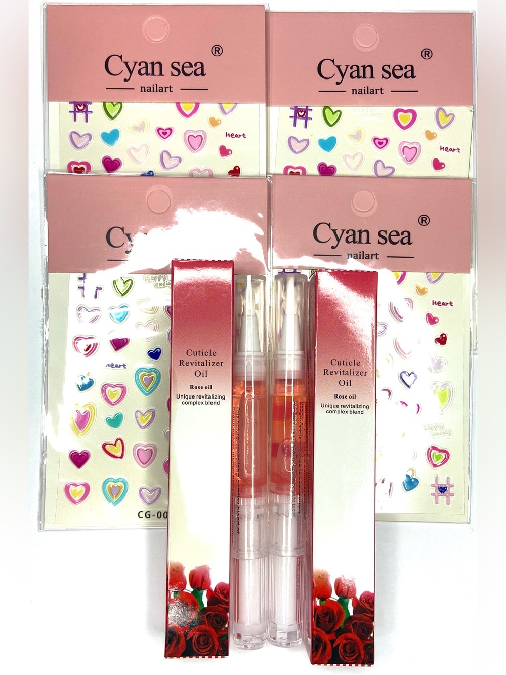Two nail cuticle oil and four nail stickers